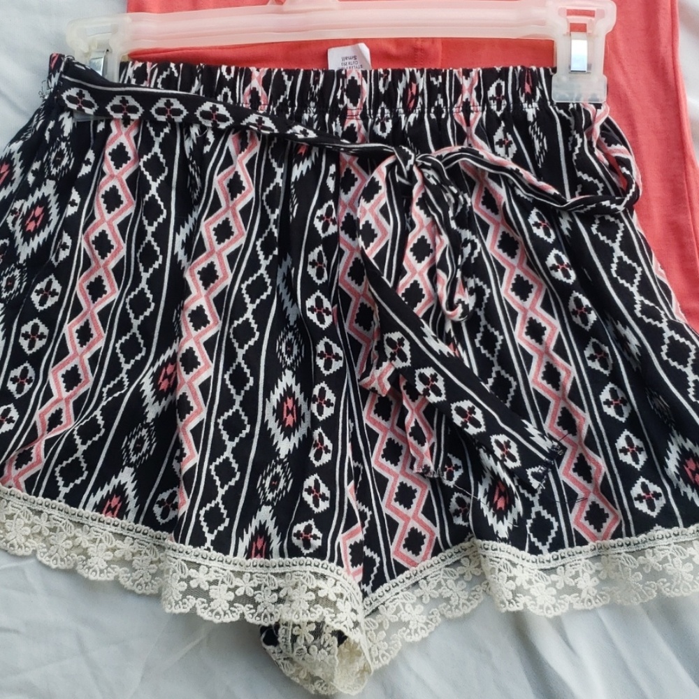 Rayon and lace ruffled shorts.